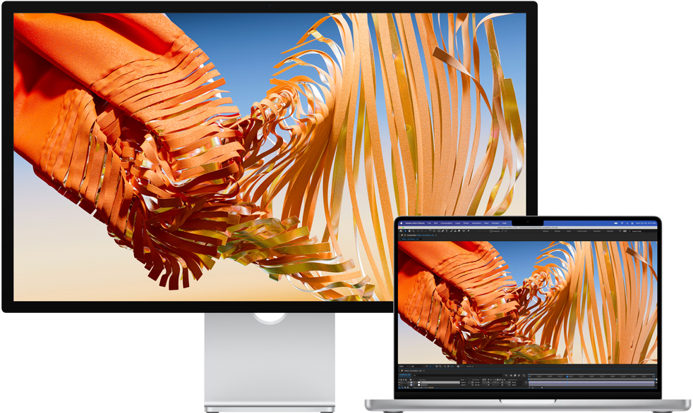 MacBook Pro đặt bên cạnh Studio Display
